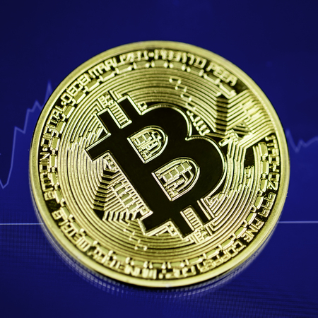 Bitcoin with diagramの写真素材