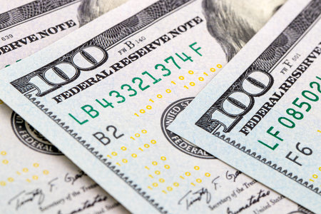 close-up 100 US dollar bills  background toned