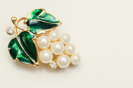 jewelry brooch with green leavesの写真素材