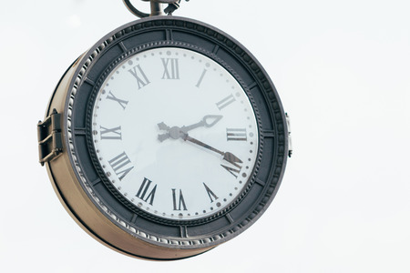 Vintage clock close-up on buildings facadeの写真素材