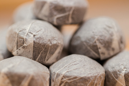 Press packed dry teal leaves backgroundの写真素材