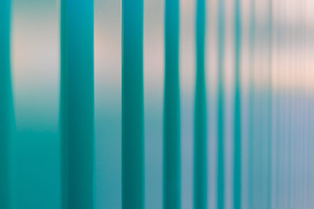 Green metal fence backgroundの写真素材