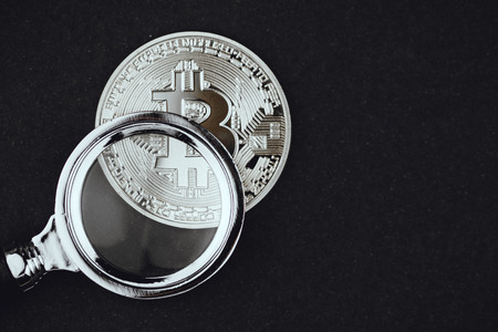 Bitcoin under the magnifierの写真素材