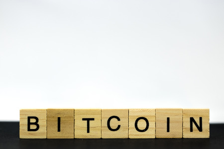 Bitcoin from letters on a black backgroundの写真素材