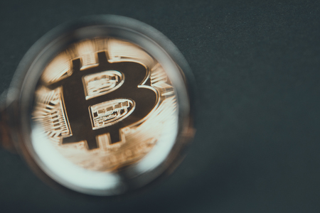 Bitcoin under the magnifierの写真素材