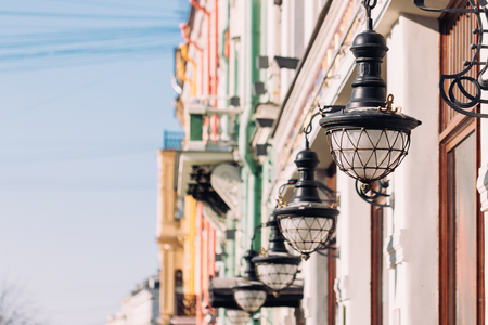 Vintage lantern on buildings facadeの写真素材