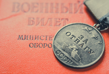 Close-up of vintage medal for honor on red USSR military idのeditorial素材