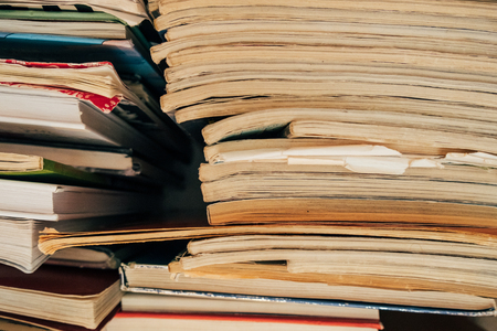 Pile of old journals and books close-upの写真素材