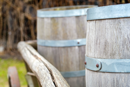 Close-up of barrels for transporting goods on antique cart with threeの写真素材