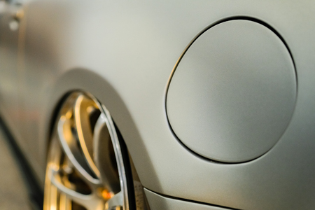 Car oil filler cap close-up.の写真素材