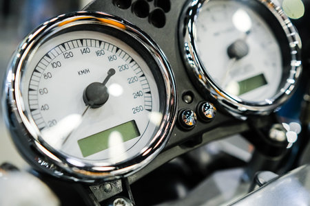 Motorcycle speedometer close up.