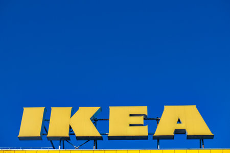 RUSSIA, ST.PETERSBURG - May 05, 2018: Logo IKEA on a shopping center on a background of blue skyのeditorial素材