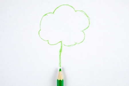 Concept of creation and conservation of nature. Tree image drawn by green pencil on white paper.の写真素材