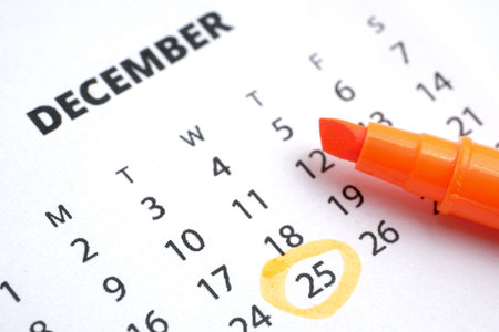 Christmas concept. December 25th is marked on the calendar 2019 with an orange marker.の写真素材