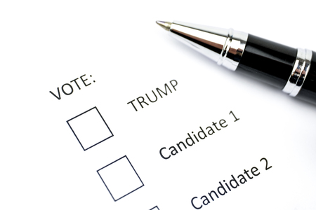 Voting ballot. US presidential election concept. Pen on white paper.の写真素材