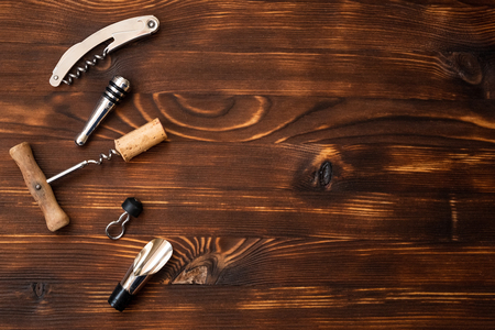 A wine accessories on wooden background. Top view with copy space.の写真素材