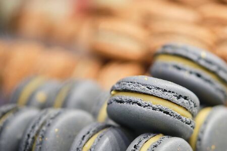 Delicious and beautiful gray macaroons on sale. Close up.の写真素材