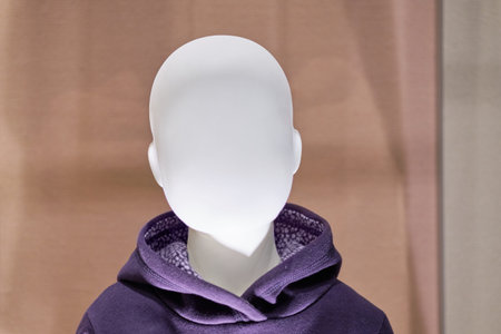 Bust White Mannequin Baby in jumper. Close up.