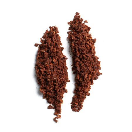 abstract coffee bean from grinding on a white background. close up.の写真素材
