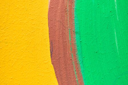 Abstract stucco texture of green, brown and yellow. Close up.の写真素材