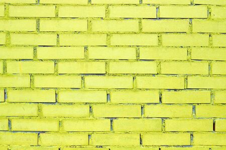 Texture and background of brick with yellow paint. Close up.の写真素材