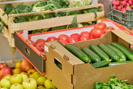 Market counter with vegetables and fruits. Close up.の写真素材