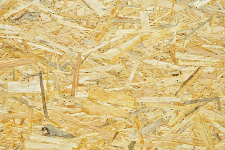 Pressed sawdust as background and texture. Close up.