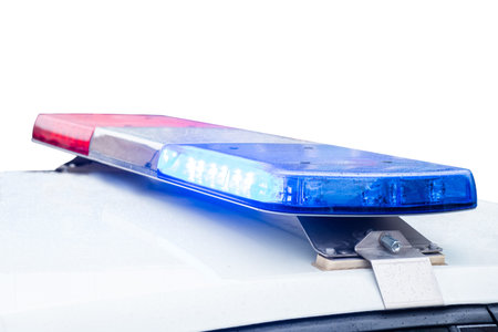 Police car with signal lights red and blue. Isolated. Close up.