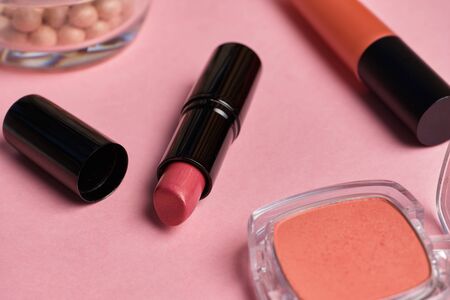 Set of female cosmetics on a pink backgroundの写真素材