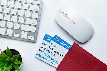 World travel business concept with tickets and passport and keyboardの写真素材