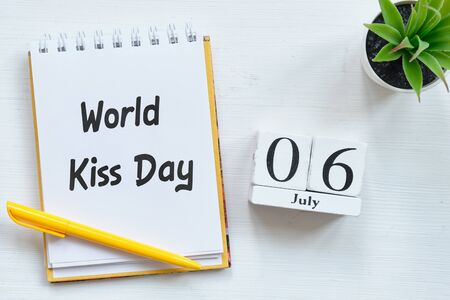 6th july World Kiss Day sixth of month calendar concept on wooden blocksの写真素材