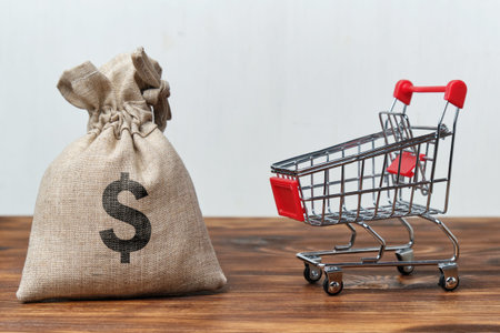 Shopping concept. A bag of money next to a store cart