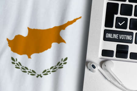 Online voting concept in Republic of Cyprus. Keyboard near country flagの写真素材