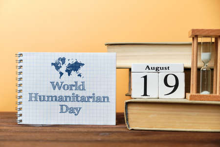 19th august - World Humanitarian Day. Nineteenth day month calendar concept on wooden blocks with copy spaceの写真素材
