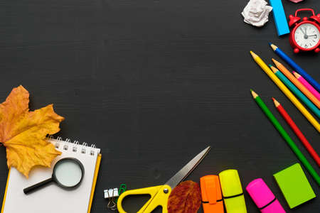 Back to school concept with stationery on wooden board.の写真素材