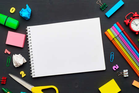 Back to school concept with notepad copy space and stationery.の写真素材