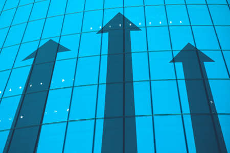 A successful concept in business and career on a glass facade.の写真素材