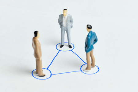 Teamwork concept with figurines people and connections.