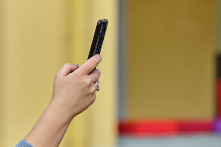 Person takes a photo from a smartphone.