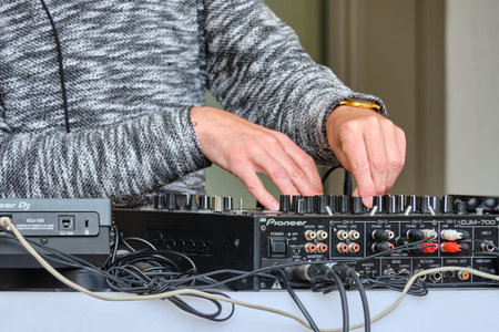 RUSSIA, ST.PETERSBURG - August 24, 2020: DJ performs at a concert and plays instruments.