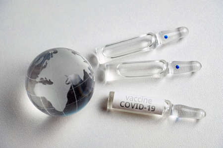 Globalization and vaccination concept around the world.の写真素材