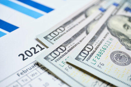 Concept of the American dollar in 2021 on the calendar.