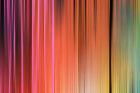Abstract gradient colored background blurred in motion.