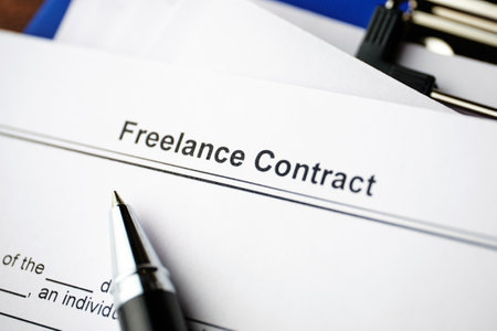 Legal document Freelance Contract on paper close up.の写真素材