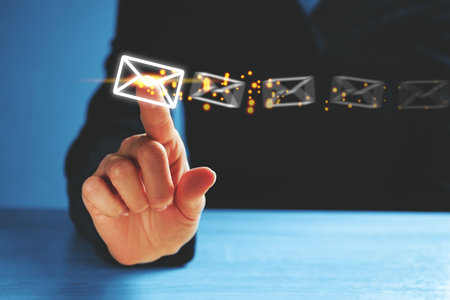 Person clicks on abstract envelope as email concept.の写真素材