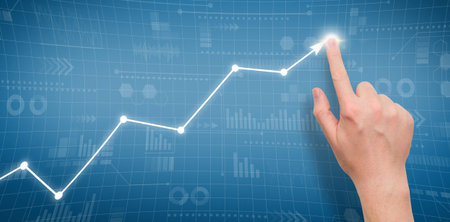 Person points to growth graph on graphical display.