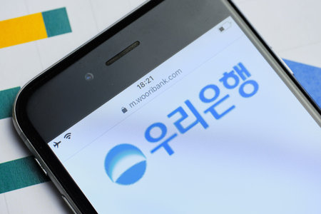 russia, st.petersburg, 14 February 2021 logo Woori Bank on the website screen smartphone. Close up.