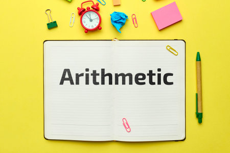 Concept of teaching program in arithmetic in notebook with top view.