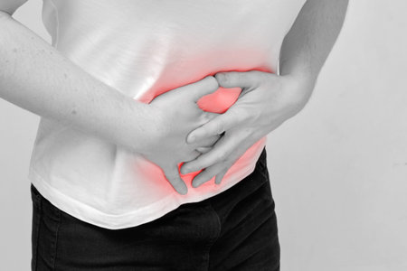 Poor digestion and no diet concept. The person holds on to the belly