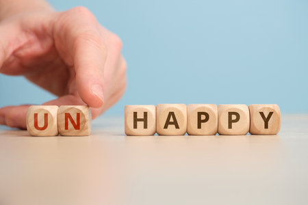 The concept of happy and unhappy as an antonym and changeの写真素材